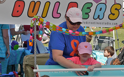 Setup a booth at Fun4 Gator Kids Touch-a-Truck